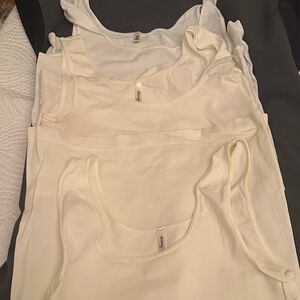 1 White and 2 Cream skinny TeesTank Tops…. Lot of 3